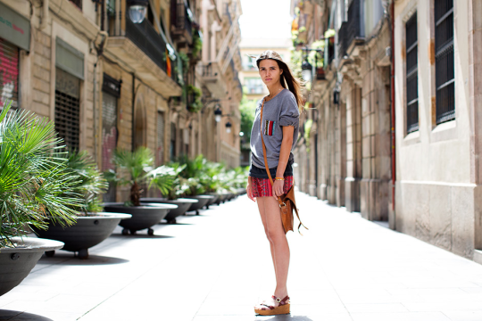 Woman in Barcelona gothic wearing shorts in the summer