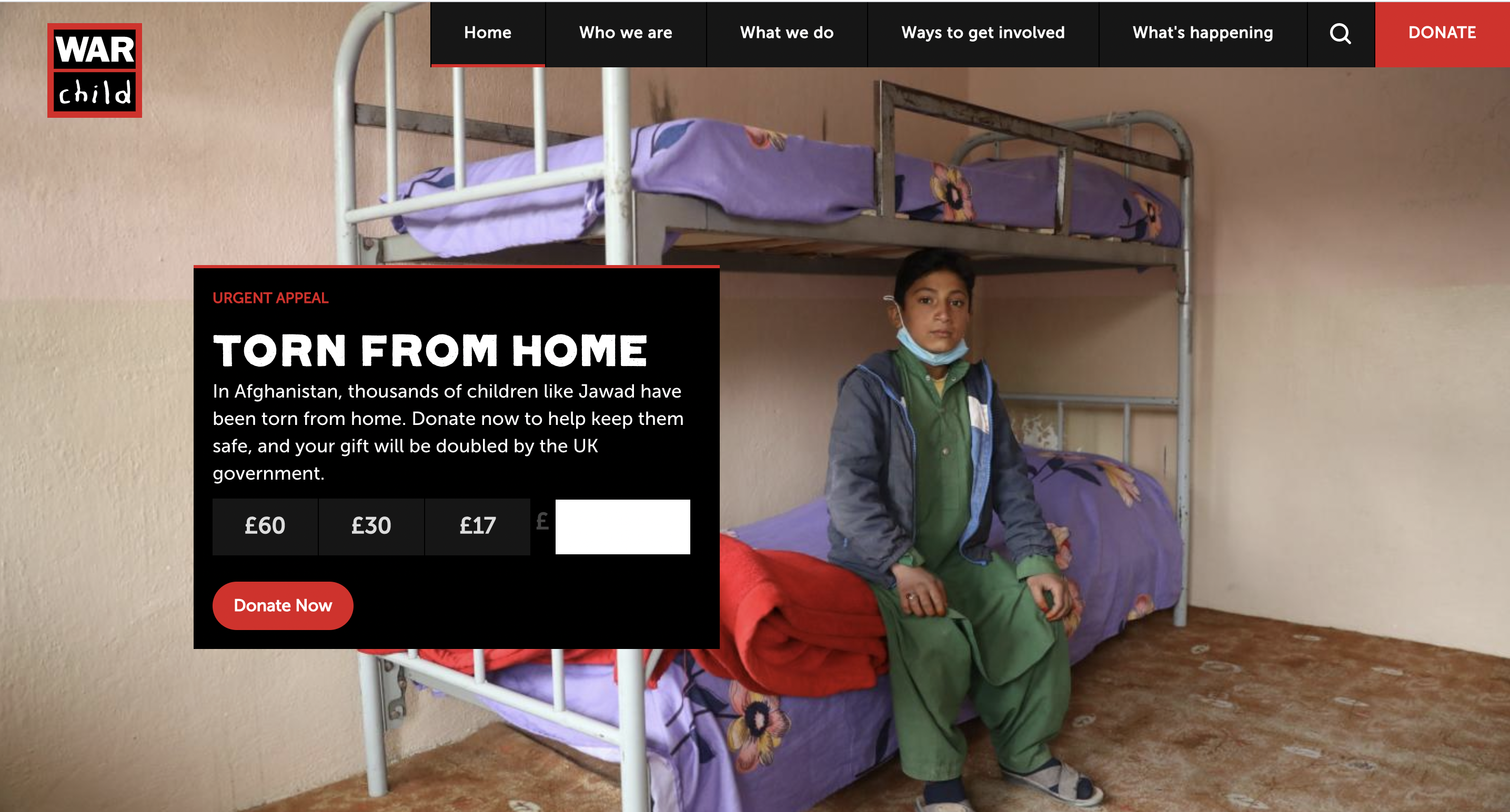 War Child website showing child sitting on bunk bed with donation request overlay