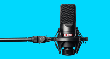 Podcast microphone on blue background